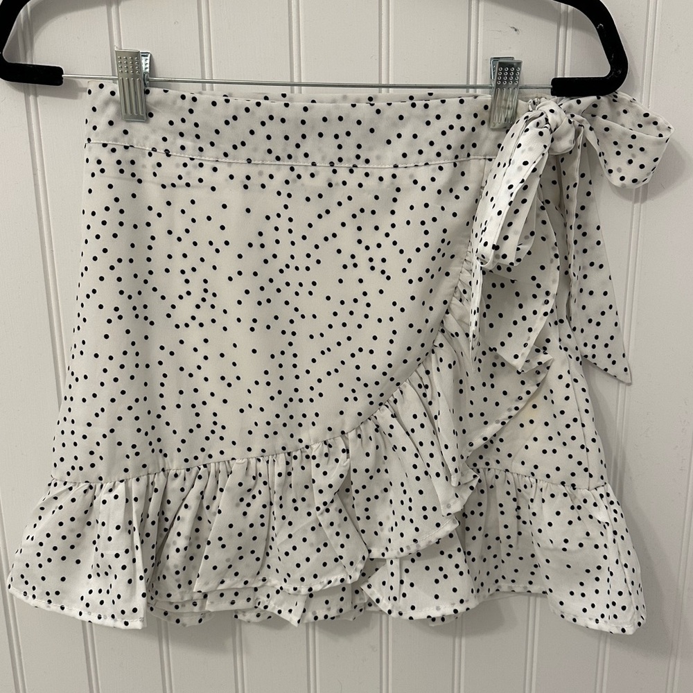 White skirt with black polka-dots and tie on the side, size S
